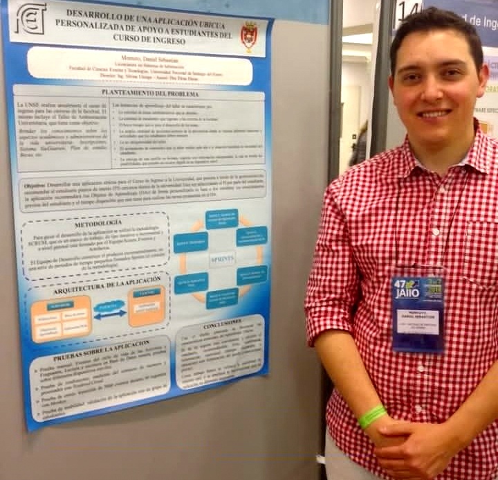 Egresado y su poster de investigación